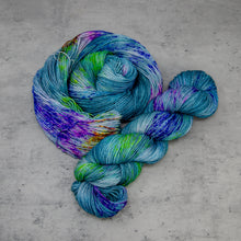 Load image into Gallery viewer, Poseidon - Hand Dyed Super Sock Fingering Weight 75/25 Merino Nylon Yarn, UV Reactive Deep Teal Multicolored, 463 Yards (423 Meters)
