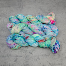 Load image into Gallery viewer, Surfing - Hand Dyed Special Sock, Fingering Weight 90/10 Superwash Merino Silk Yarn, UV Reactive Aqua Multi Speckled, 463 Yards (423 M)
