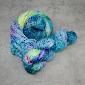 Poseidon - SPARKLE Sock Weight, Hand Dyed Superwash Merino Wool with Nylon/Lurex Yarn, UV Reactive Deep Teal Multicolored, 437 Yards (400 M)
