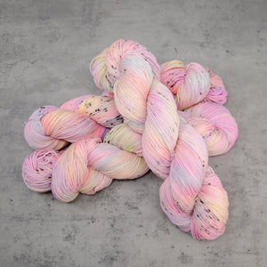 Desert Rainbow - Hand Dyed Special Sock, Fingering Weight 90/10 Superwash Merino Silk Yarn, UV Reactive Pastel Rainbow, 463 Yards (423 M)