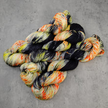 Load image into Gallery viewer, H’ween - Hand Dyed Super Sock Fingering Weight 75/25 Merino Wool Nylon Yarn, UV Reactive Black Orange Yellow, 463 Yards (423 Meters)
