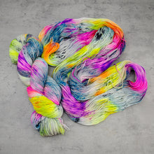 Load image into Gallery viewer, Rocket - Hand Dyed Feather Fingering Weight, SW Merino Wool, Baby Alpaca, Silk Yarn, UV Neon Multicolor Speckle, 437 Yards (400 M)
