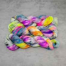 Load image into Gallery viewer, Rocket - Hand Dyed Feather Fingering Weight, SW Merino Wool, Baby Alpaca, Silk Yarn, UV Neon Multicolor Speckle, 437 Yards (400 M)
