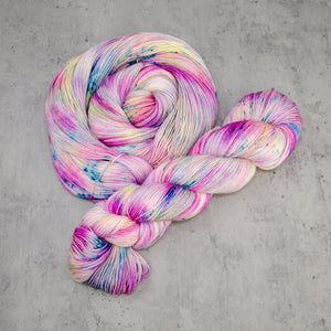 Roseate - Hand Dyed Feather Fingering Weight, SW Merino Wool, Baby Alpaca, Silk Yarn, UV Reactive Pink Cream Multi, 437 Yards (400 M)