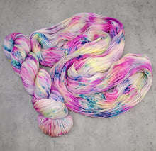 Load image into Gallery viewer, Roseate - Hand Dyed Feather Fingering Weight, SW Merino Wool, Baby Alpaca, Silk Yarn, UV Reactive Pink Cream Multi, 437 Yards (400 M)
