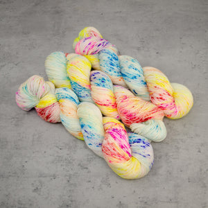 Springtime - Hand Dyed Special Sock, Fingering Weight 90/10 Superwash Merino Silk Yarn, UV Reactive Rainbow Speckles, 463 Yards (423 Meters)