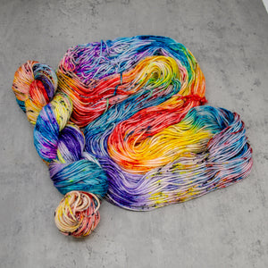 Primarily - Hand Dyed DK Weight Superwash Merino Wool and Silk Yarn, Bright Random Rainbow with Black Speckle, 245 Yards (224 Meters)