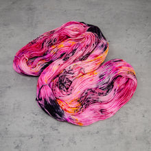 Load image into Gallery viewer, Lipstick - Hand Dyed MCN DK Weight Cashmere Merino Wool Nylon Yarn, UV Reactive Pink Red Black Speckled, 231 Yards (211 Meters)
