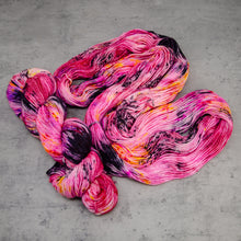 Load image into Gallery viewer, Lipstick - Hand Dyed MCN DK Weight Cashmere Merino Wool Nylon Yarn, UV Reactive Pink Red Black Speckled, 231 Yards (211 Meters)
