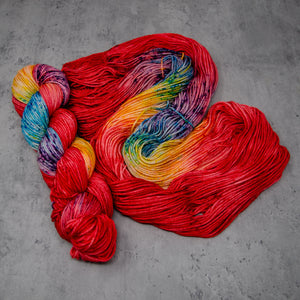Macaw - Hand Dyed DK Weight Superwash Merino Wool and Silk Yarn, Bright Red Rainbow Speckled, 245 Yards (224 Meters)